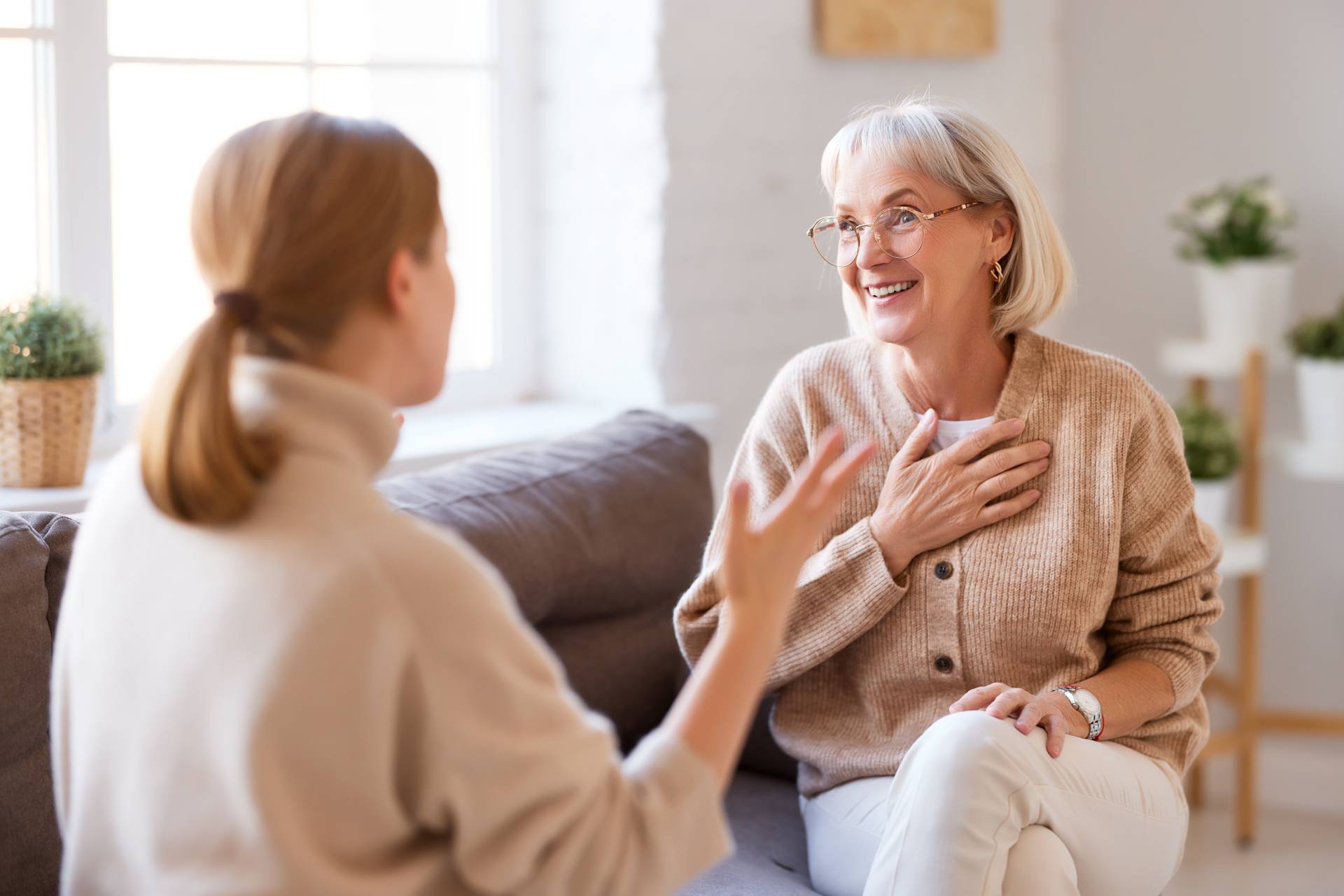 A woman talking to her aging parent about her future.