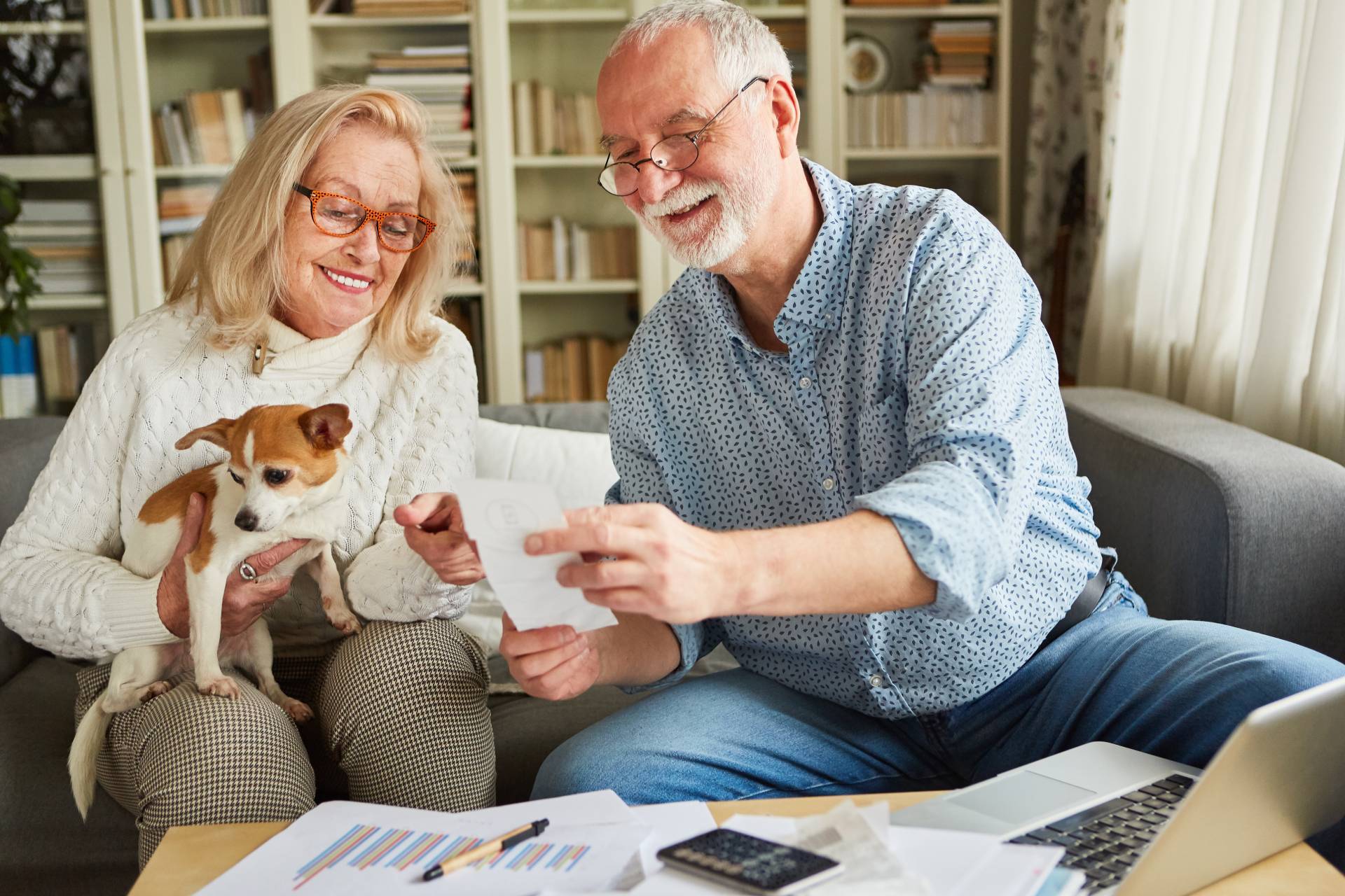 Two seniors research the cost of senior care to find what’s best for them